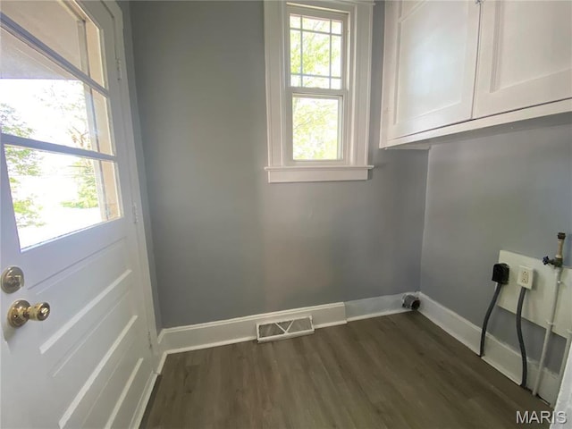 616 N Church St, Belleville, IL 62220 - washroom with cabinet space, baseboards, dark wood-type flooring, and hookup for an electric dryer