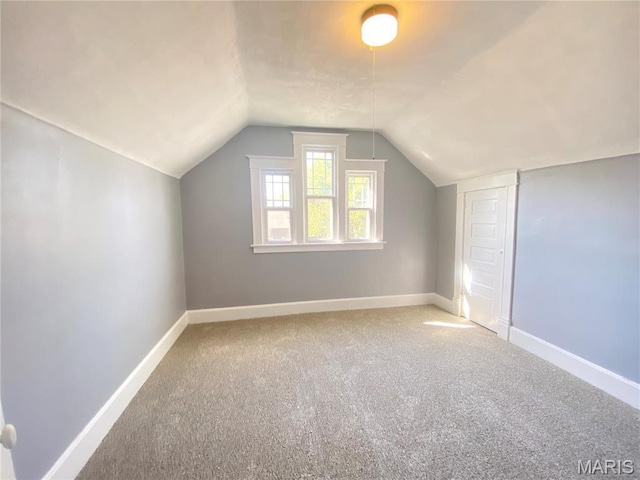 616 N Church St, Belleville, IL 62220 - bonus room featuring carpet floors, vaulted ceiling, and baseboards
