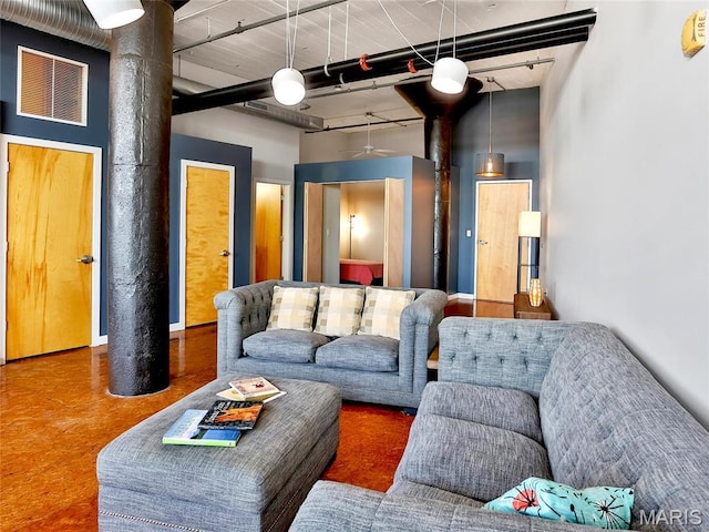 living room featuring a high ceiling