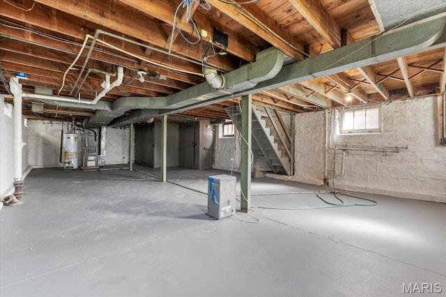 5034 Queens Ave, Saint Louis, MO 63115 - below grade area with stairs and water heater