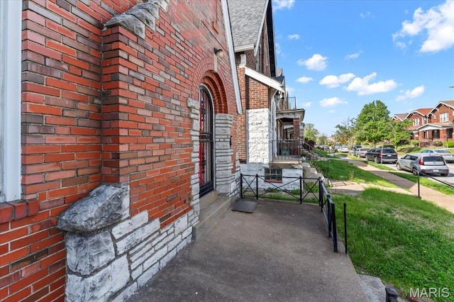 5034 Queens Ave, Saint Louis, MO 63115 - view of home's exterior with brick siding and a shingled roof