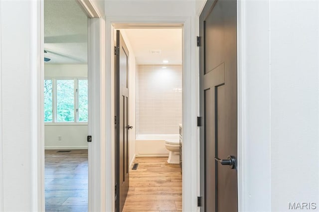 11 Forrester Dr, Manchester, MO 63011 - hallway featuring light wood-type flooring