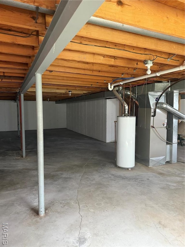 11 Forrester Dr, Manchester, MO 63011 - unfinished basement featuring gas water heater and heating unit