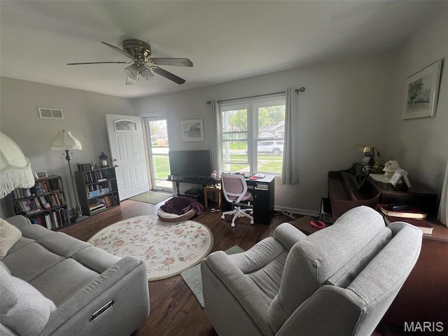 417 E 5th St, Ramsey, IL 62080 - living area featuring a ceiling fan and wood finished floors
