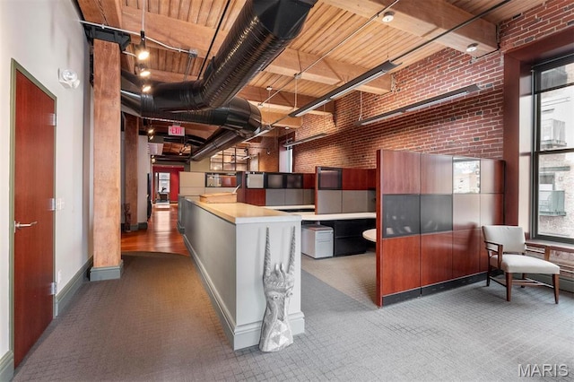 reception area with brick wall