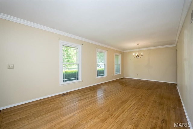 739 Muir View Dr, Ballwin, MO 63011 - unfurnished room featuring a chandelier, light wood-type flooring, baseboards, and ornamental molding