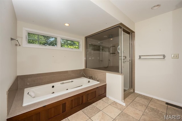 739 Muir View Dr, Ballwin, MO 63011 - full bath with a stall shower, a tub with jets, tile patterned floors, baseboards, and recessed lighting