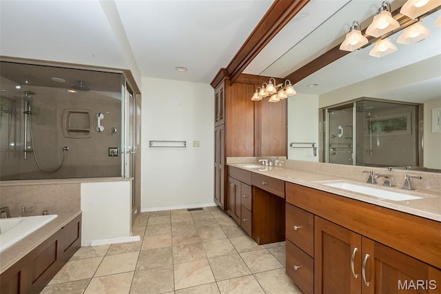 739 Muir View Dr, Ballwin, MO 63011 - full bathroom with a stall shower, double vanity, a garden tub, a chandelier, and tile patterned flooring
