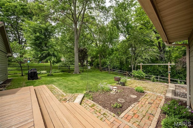 739 Muir View Dr, Ballwin, MO 63011 - view of yard featuring a wooden deck and view of wooded area