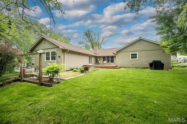 739 Muir View Dr, Ballwin, MO 63011 - rear view of property featuring a deck, a yard, and a chimney