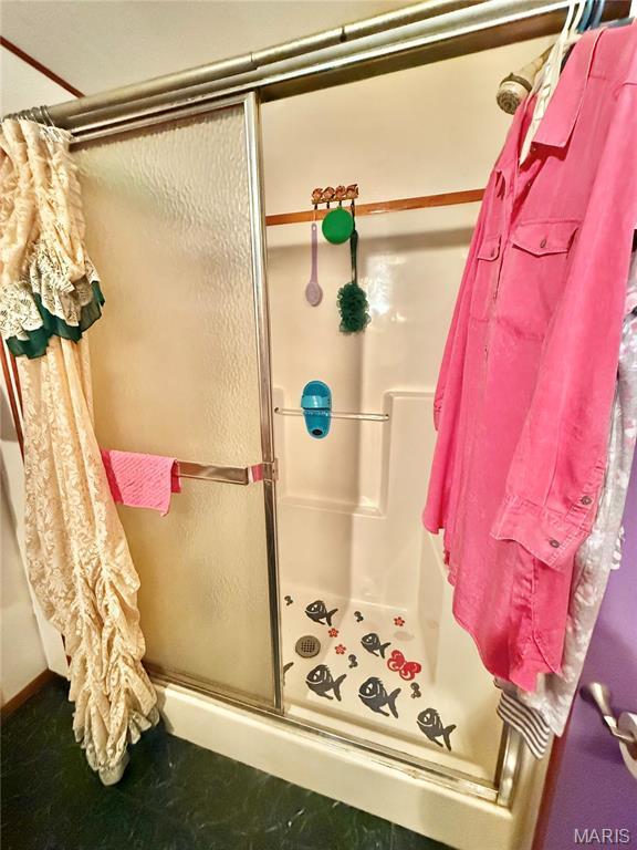 full bathroom with a shower stall