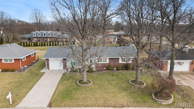 view of front of home with driveway, brick siding, and a front lawn