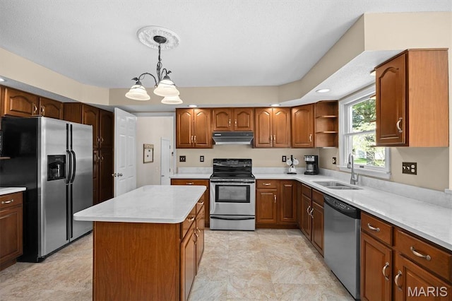 109 Pleasant Ridge Dr, Edwardsville, IL 62025 - kitchen featuring stainless steel appliances, a sink, under cabinet range hood, a chandelier, and light countertops