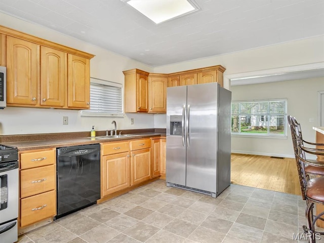 422 Washington St, Red Bud, IL 62278 - kitchen featuring appliances with stainless steel finishes, a sink, and dark countertops