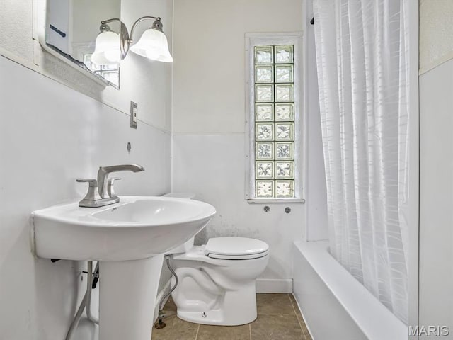 422 Washington St, Red Bud, IL 62278 - full bathroom with toilet, tile patterned flooring, and shower / bathtub combination with curtain
