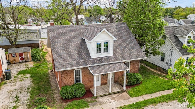 306 Walnut St, Waterloo, IL 62298 - view of front of home with brick siding and a shingled roof