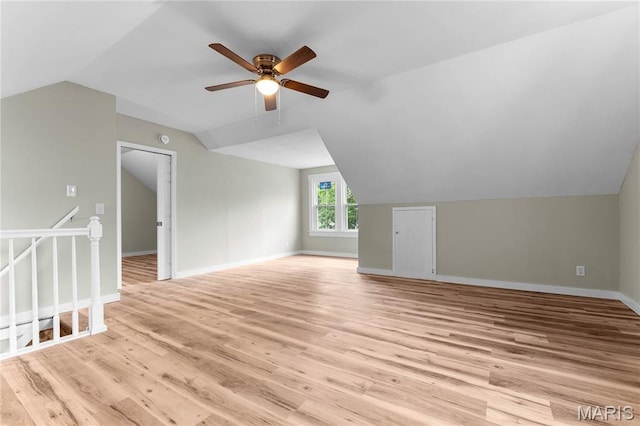 306 Walnut St, Waterloo, IL 62298 - bonus room with vaulted ceiling, light wood-type flooring, a ceiling fan, and baseboards