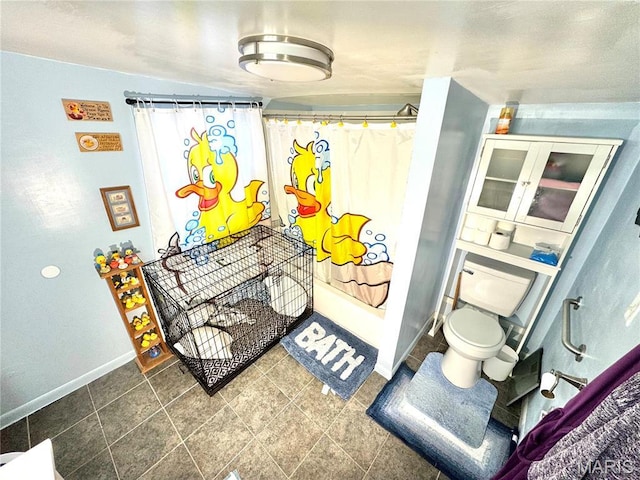 619 Frankford Rd, Louisiana, MO 63353 - full bathroom with baseboards, toilet, and shower / tub combo