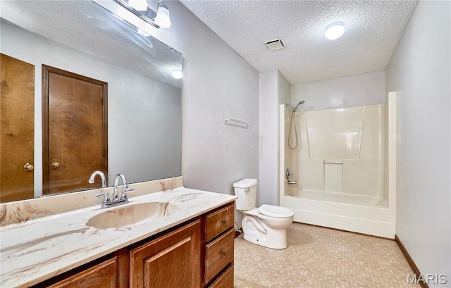 full bath featuring a textured ceiling, toilet, vanity, and shower / bath combination