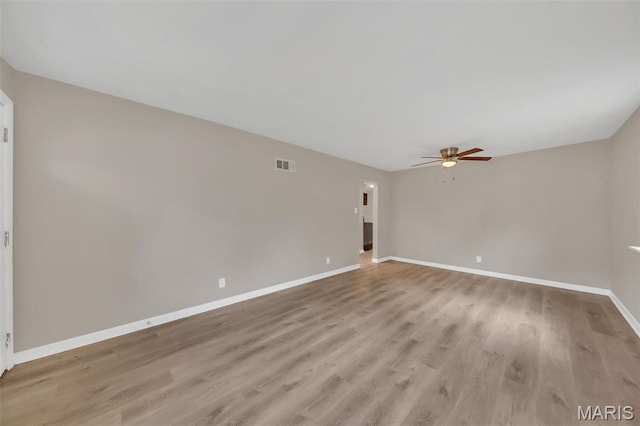 6635 Donald St, Saint Louis, MO 63121 - spare room with baseboards, ceiling fan, and light wood finished floors