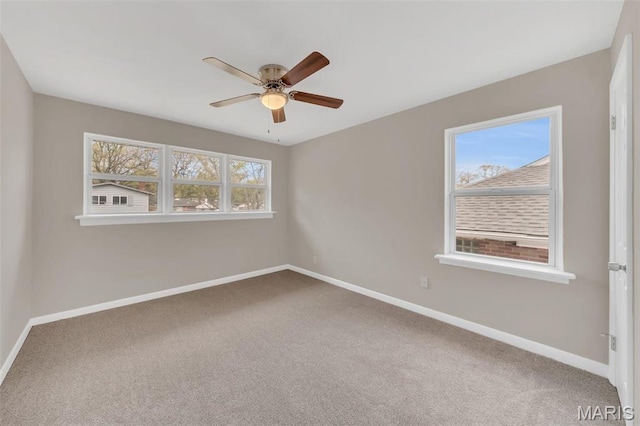 6635 Donald St, Saint Louis, MO 63121 - carpeted empty room featuring baseboards and a ceiling fan