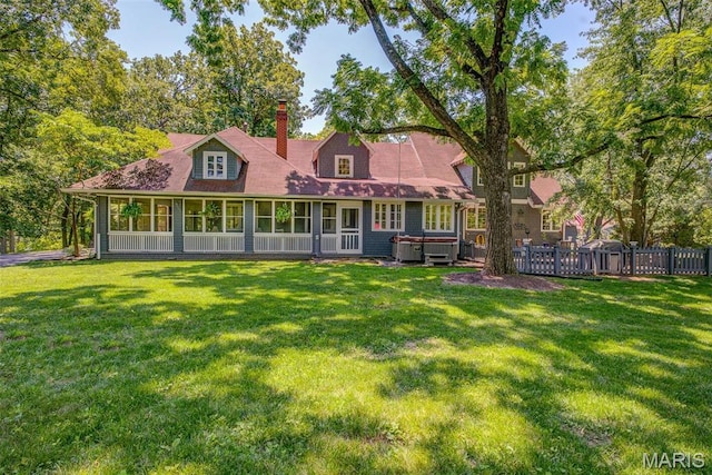 1577 Kehrs Mill Rd, Chesterfield, MO 63005 - rear view of house with a hot tub and a chimney