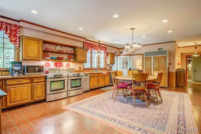 1577 Kehrs Mill Rd, Chesterfield, MO 63005 - kitchen with stainless steel appliances, ornamental molding, a chandelier, a sink, and decorative light fixtures