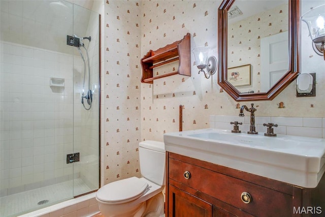 1577 Kehrs Mill Rd, Chesterfield, MO 63005 - full bathroom featuring wallpapered walls, a shower stall, toilet, and vanity