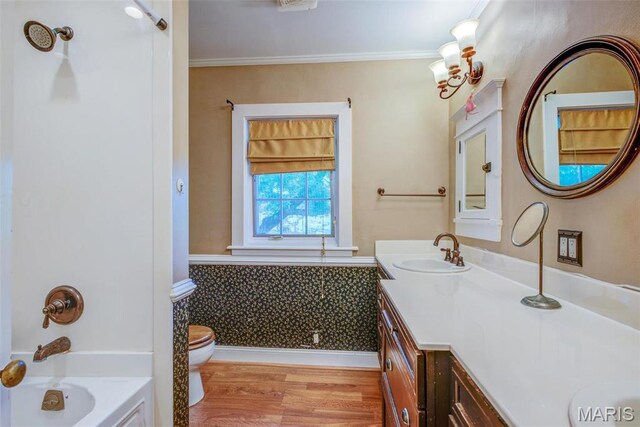 1577 Kehrs Mill Rd, Chesterfield, MO 63005 - bathroom with wood finished floors, vanity, toilet, ornamental molding, and baseboards