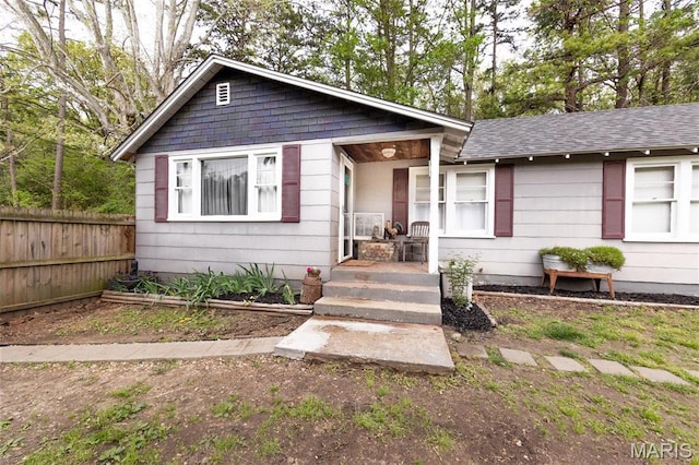 631 State Route T, Newburg, MO 65550 - bungalow featuring a porch, fence, and a shingled roof