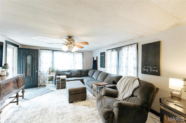 631 State Route T, Newburg, MO 65550 - living area featuring plenty of natural light and a ceiling fan
