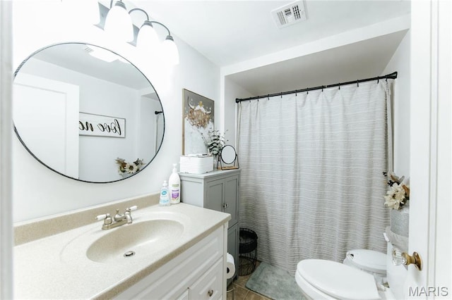 631 State Route T, Newburg, MO 65550 - bathroom featuring toilet, vanity, and tile patterned floors