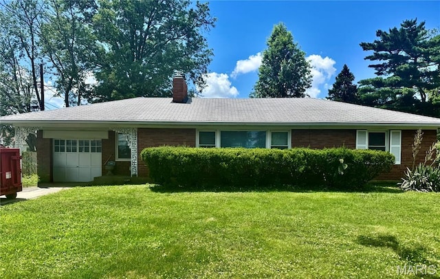 1709 Korando Ave, Saint Louis, MO 63114 - ranch-style home featuring an attached garage, a chimney, a front yard, and brick siding
