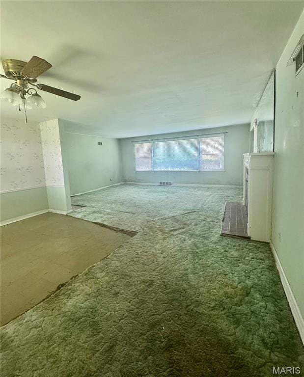 1709 Korando Ave, Saint Louis, MO 63114 - unfurnished room with carpet floors and a ceiling fan