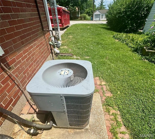 1709 Korando Ave, Saint Louis, MO 63114 - exterior view of a central AC unit and brick siding