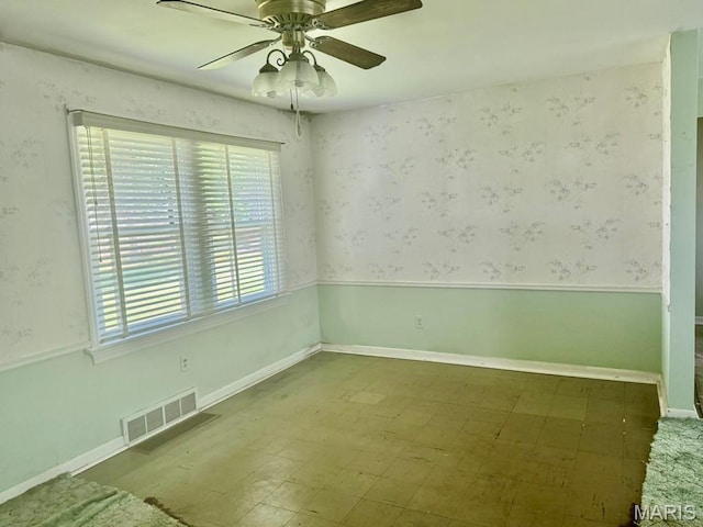 1709 Korando Ave, Saint Louis, MO 63114 - empty room featuring ceiling fan and tile patterned floors