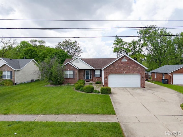 ranch-style home with brick siding, concrete driveway, an attached garage, and a front yard