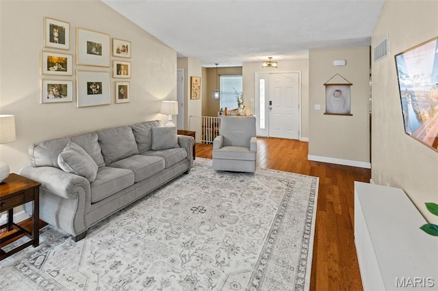living area with wood finished floors