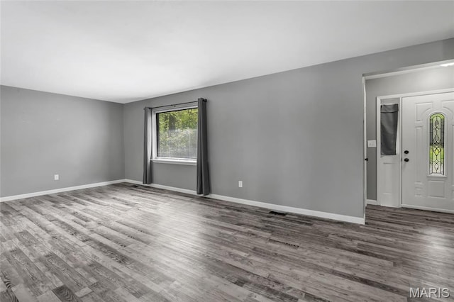 1211 Napoleon Dr, Bonne Terre, MO 63628 - unfurnished room featuring dark wood-style floors and baseboards