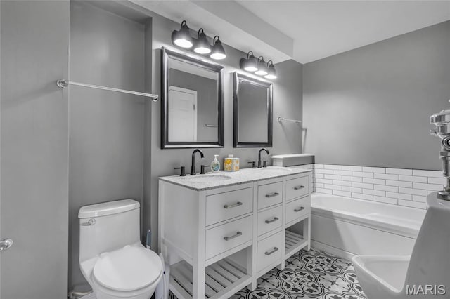 1211 Napoleon Dr, Bonne Terre, MO 63628 - bathroom with a garden tub, double vanity, tile patterned flooring, and toilet