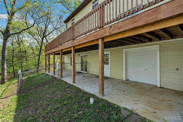 1211 Napoleon Dr, Bonne Terre, MO 63628 - view of patio featuring a garage and a deck