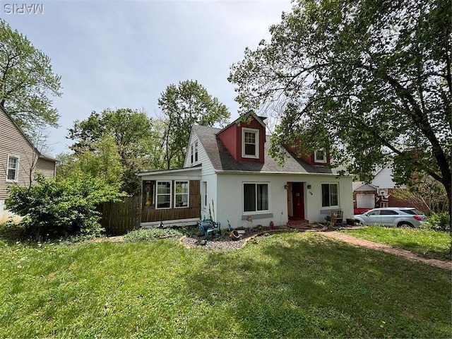 126 Sunset Ave, Collinsville, IL 62234 - cape cod home featuring a front lawn and a shingled roof