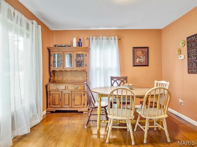 126 Sunset Ave, Collinsville, IL 62234 - dining area with wood finished floors and baseboards