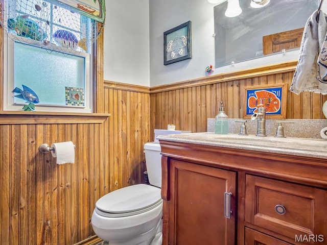 126 Sunset Ave, Collinsville, IL 62234 - half bath with toilet, a wainscoted wall, wood walls, and vanity