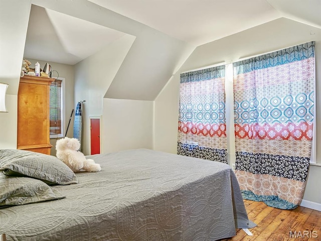126 Sunset Ave, Collinsville, IL 62234 - bedroom featuring wood finished floors and vaulted ceiling