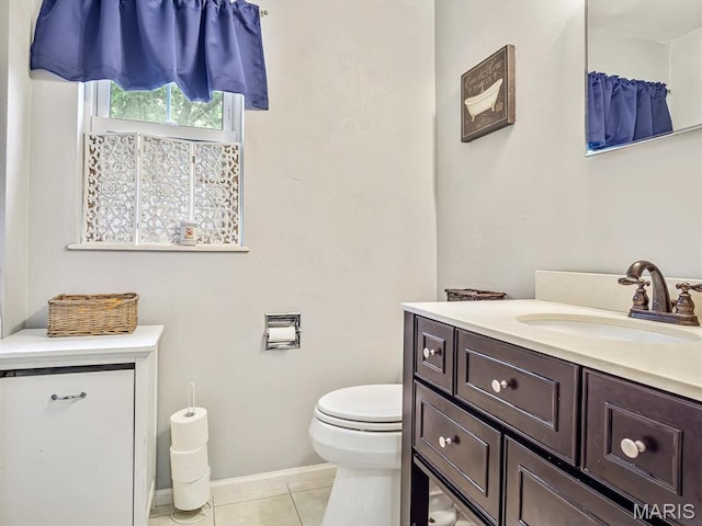 126 Sunset Ave, Collinsville, IL 62234 - bathroom featuring toilet, tile patterned flooring, vanity, and baseboards
