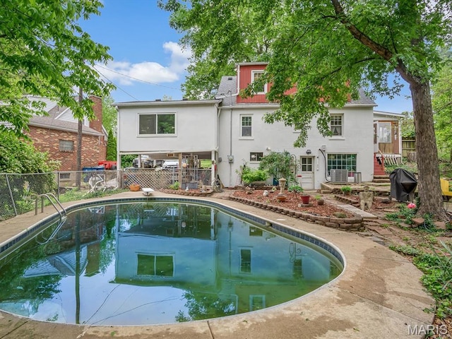 126 Sunset Ave, Collinsville, IL 62234 - view of swimming pool featuring fence, stairway, and a diving board