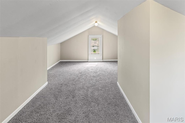1129 E 7th St, Alton, IL 62002 - additional living space with carpet, vaulted ceiling, and baseboards
