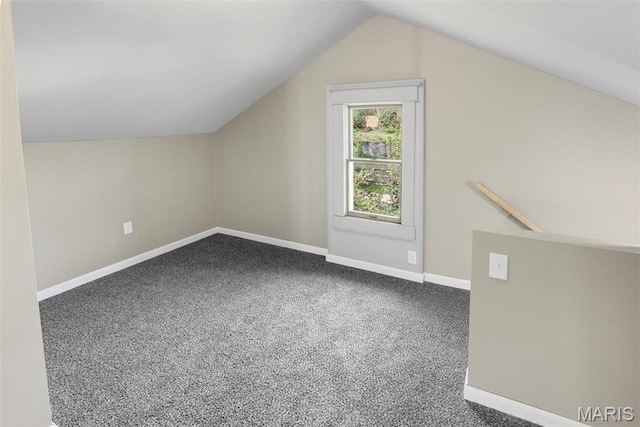 1129 E 7th St, Alton, IL 62002 - bonus room with lofted ceiling, baseboards, and carpet floors