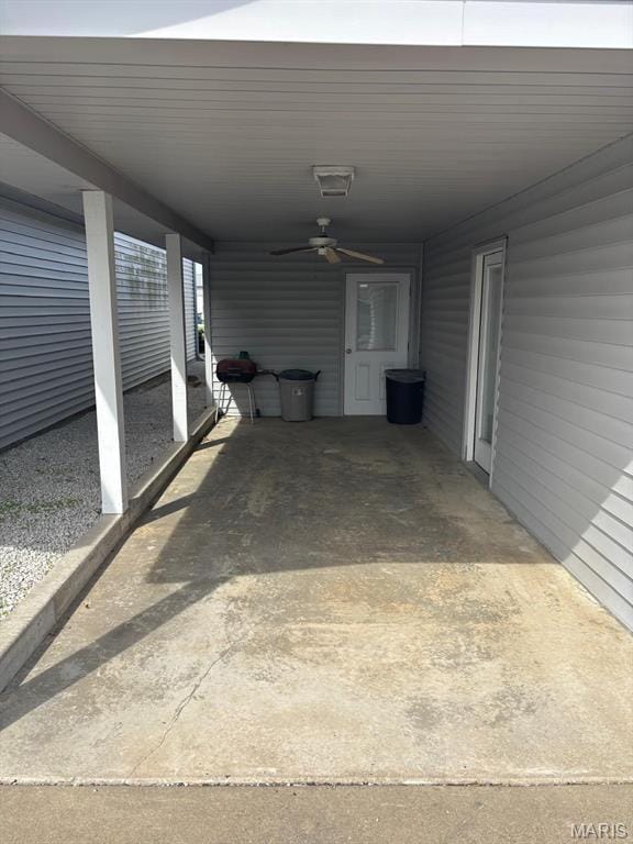 view of patio / terrace featuring a carport